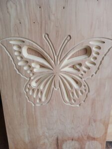 Custom wood carving of butterfly