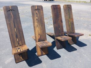 custom wooden carved chairs with mountain etching